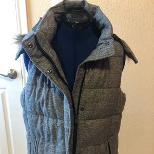 Gray vest with fur-lined removable hood